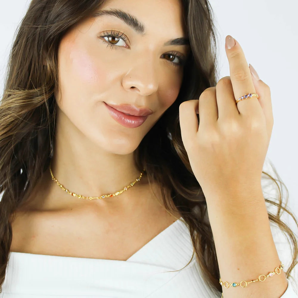 Anel com Zircônias Lavanda Banhado a Ouro 18K